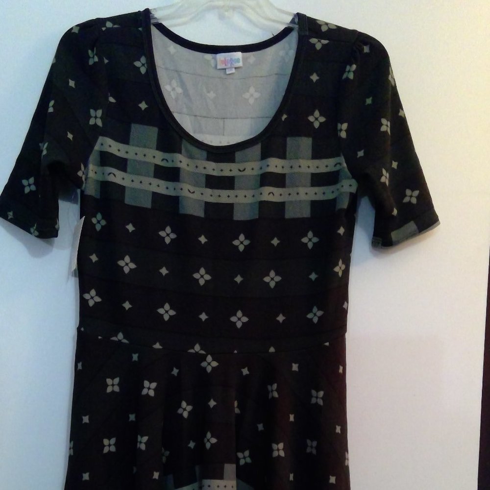 Green multi design dress NWT